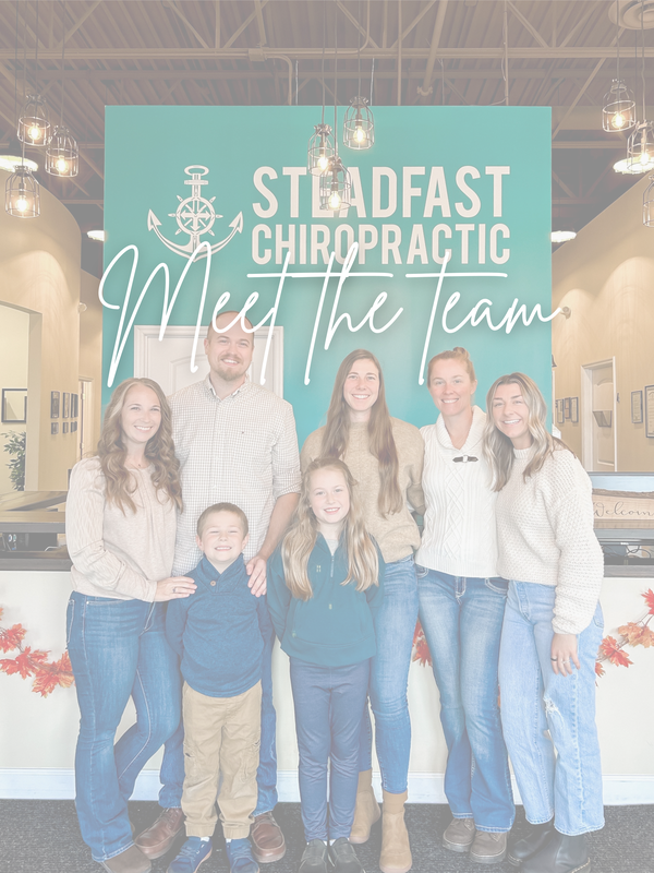Dr. Andrew Schneider with his team at Steadfast Chiropractic, Saline MI
